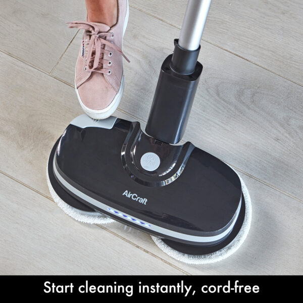 Pressing the foot switch on the base of the cordless POWERGLIDE hard floor cleaner & polisher