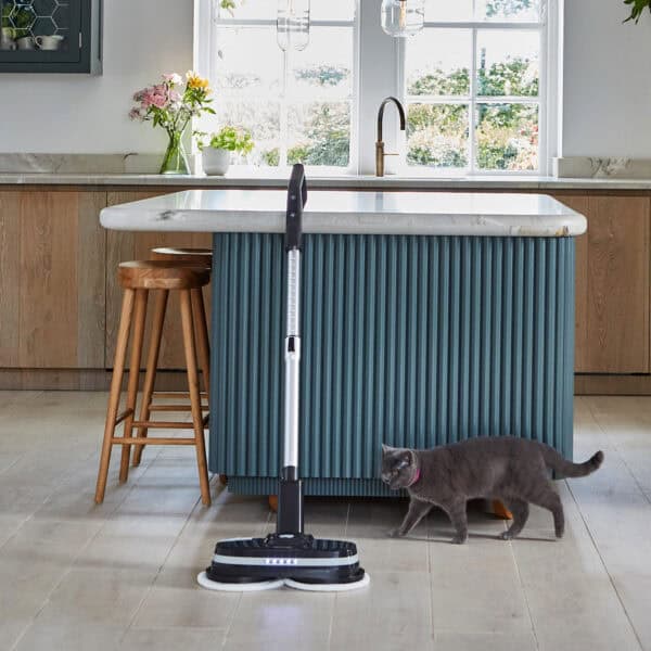 Grey PowerGlide in kitchen with tiled floor and pet
