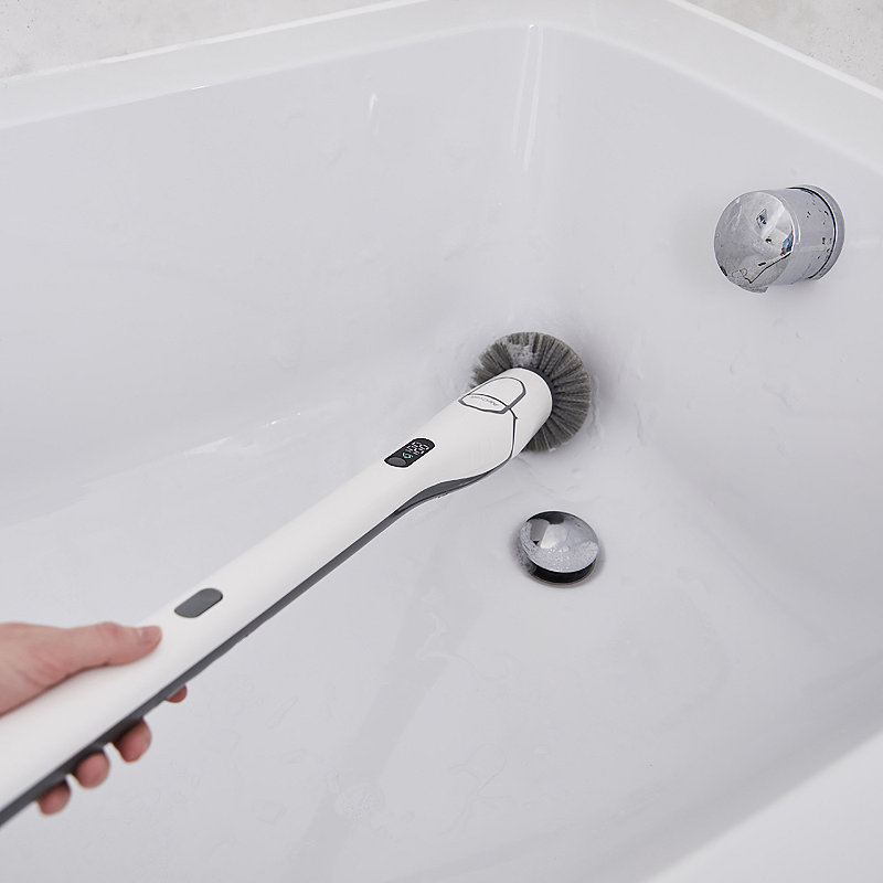 PowerScrub powerful cleaning tool scrubbing a white bath tub