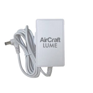 A white UK charger for the AirCraft LUME air circulator fan